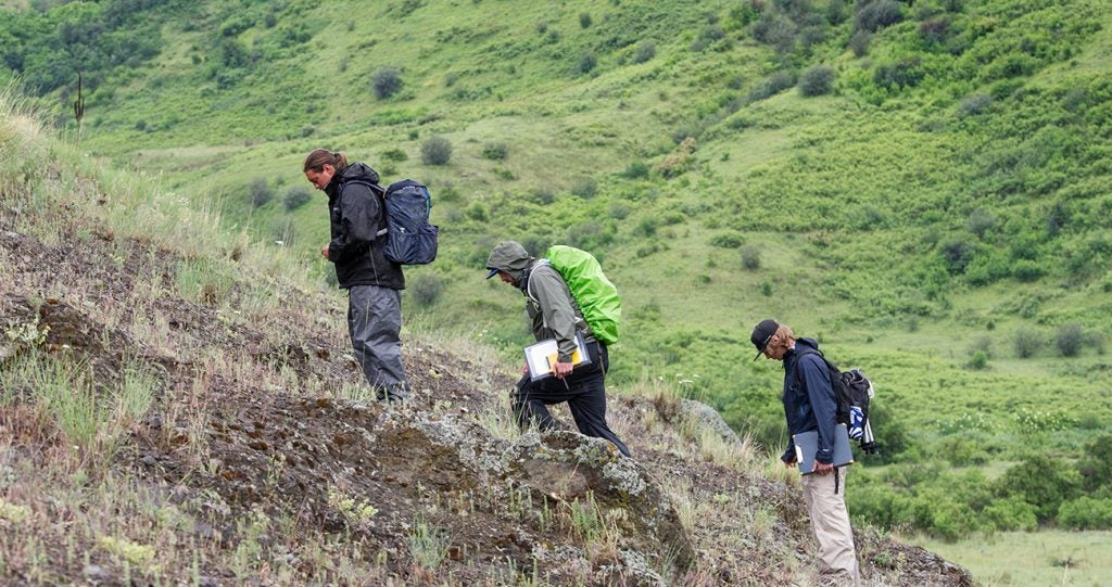 Students examining geological featured in Hells Canyon.